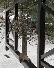 Custom made single swing driveway gate with a 3 dimensional tree in the middle